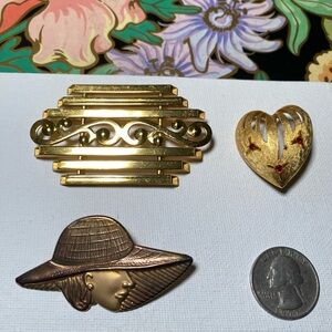 Vintage gold tone Brooches